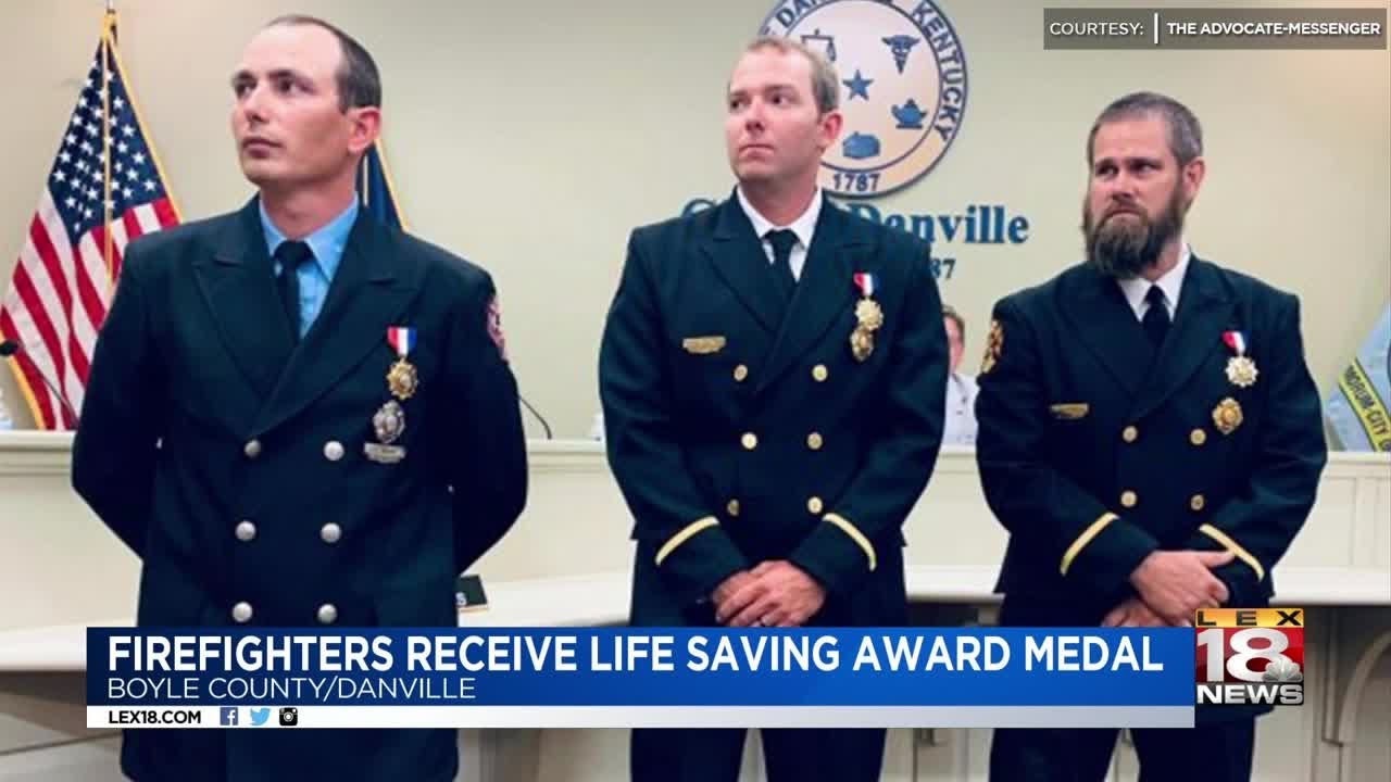 Firefighters Receive Life Saving Award Metal newspaper mockup