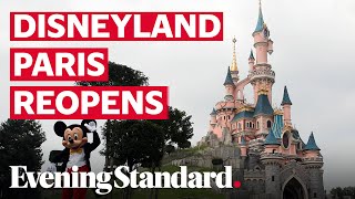 Mickey mouse greets visitors as disneyland paris reopens following
coronavirus lockdown