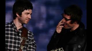 Noel and Liam Gallagher, the fork and the bottle of champagne