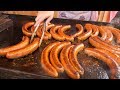 Many Hungarian sausages. Street food Budapest festival  | Sult Kolbasz