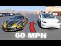 Racing supercars in Reverse! (Corvette vs Tesla)