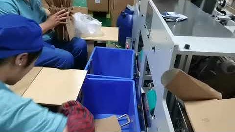 Paper handle paper pasting machine double robot arm