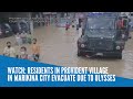 Residents of Provident village in Marikina evacuate due to Ulysses