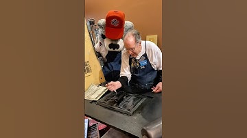 Howard and Dinger from the @SacRiverCats letterpress print a wanted poster