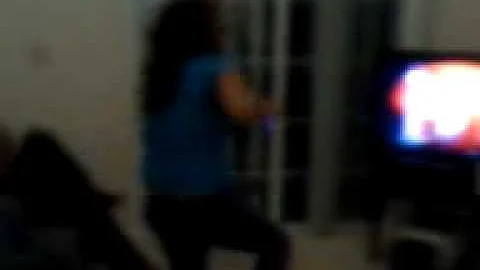 my sista playin a dancin game on da Wii