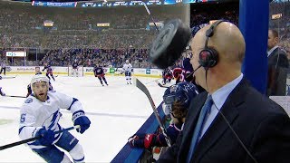 Hockey gods on Pierre McGuire's side after puck flies between the benches