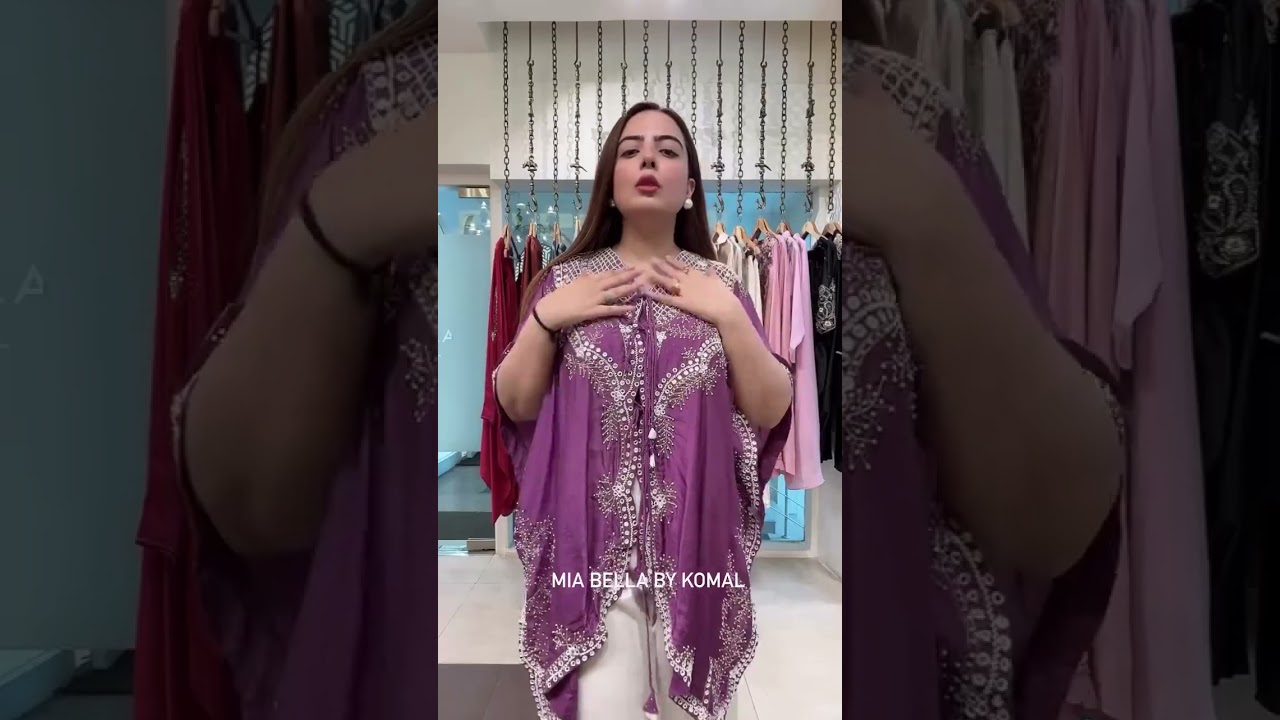 Make a style statement this festive season with our embellished cape, adorned with intricate det 1