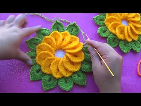 Flores tejidas a crochet de 12 pétalos con hojitas para tapetes y centros de mesa paso a paso