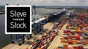 Stock Video Clip - Colorful shipping containers awaiting transportation at Charleston, SC Port