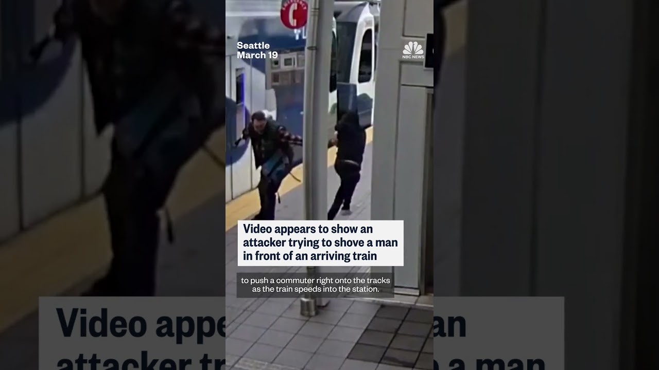 Suspect appears to push man into oncoming train path