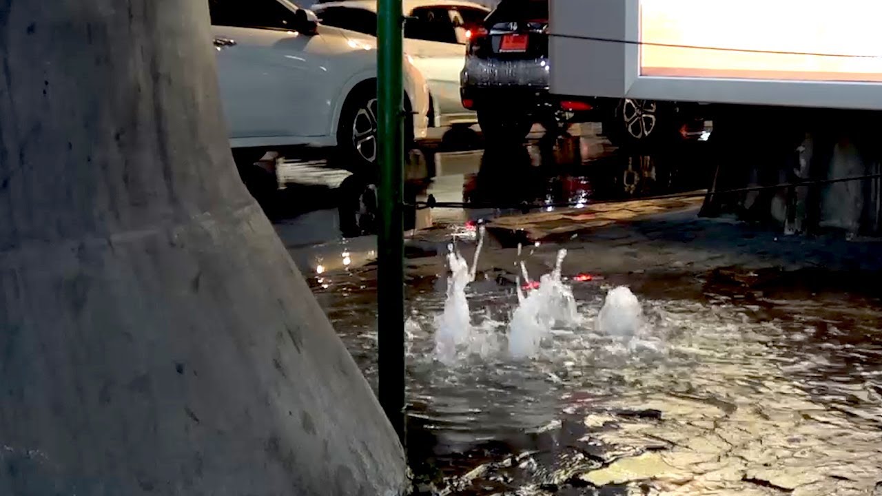 Water Bubbles Through Pavement After Rain In Bangkok YouTube