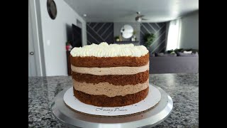 Decorating a Chocolate Sponge Cake with Whip Cream. Naked Cake. Cake Decorating