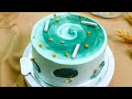 Seafoam green tornado cream cake  sponge cake reminiscent of the calmest ocean waves