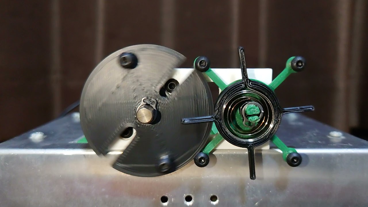 ぜんまいばねを用いた間欠回転機構 (Intermittent Rotating Mechanism with a Wind up Spring