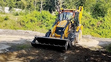 JCB Backhoe Loader Pushing Gravel and Leveling Ground - EarthPlanet