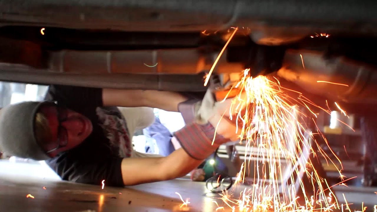 CUTTING EXHAUST OFF A WRX! YouTube