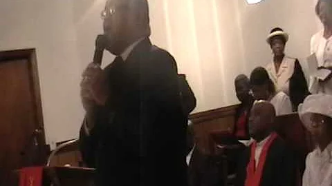 Elder Tooley singing at Mother Ernestine Brantley'...