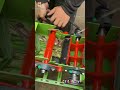 The craftsman is debugging the cutter of the scallion chopper