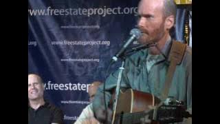 Rich Angell performs his song 'Still A Free Country' at PorcFest 2010