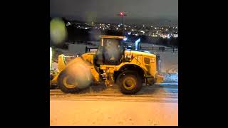 City Cat loader snow plowing up and down the street at night #shorts #snowstorm #loader #caterpillar
