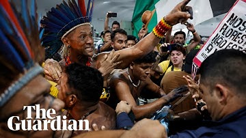 Protesters force their way into Cop30 climate summit