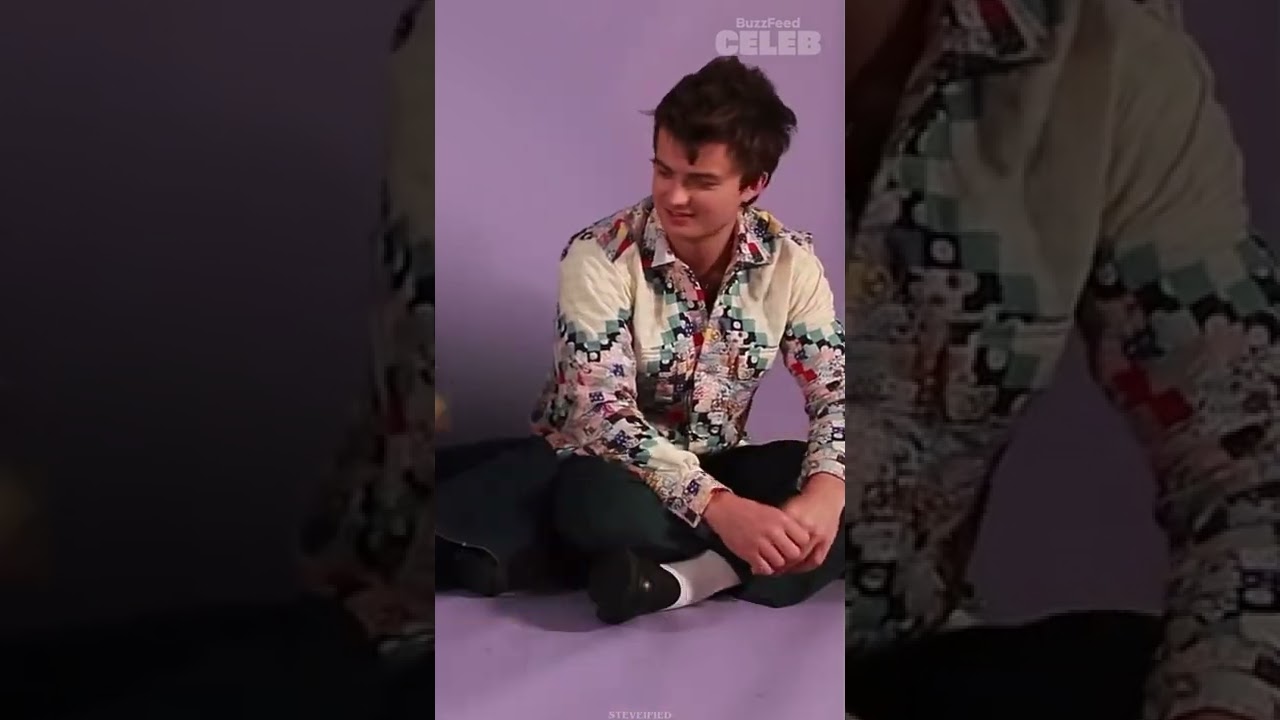 joe keery playing with puppies for 1 minute 10 seconds