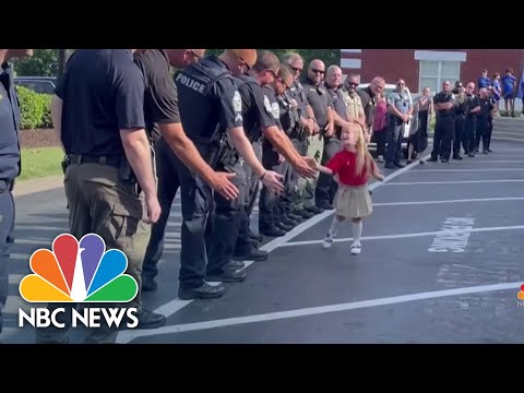 Dozens Of Officers And First Responders Welcome A 5-Year Old To Kindergarten