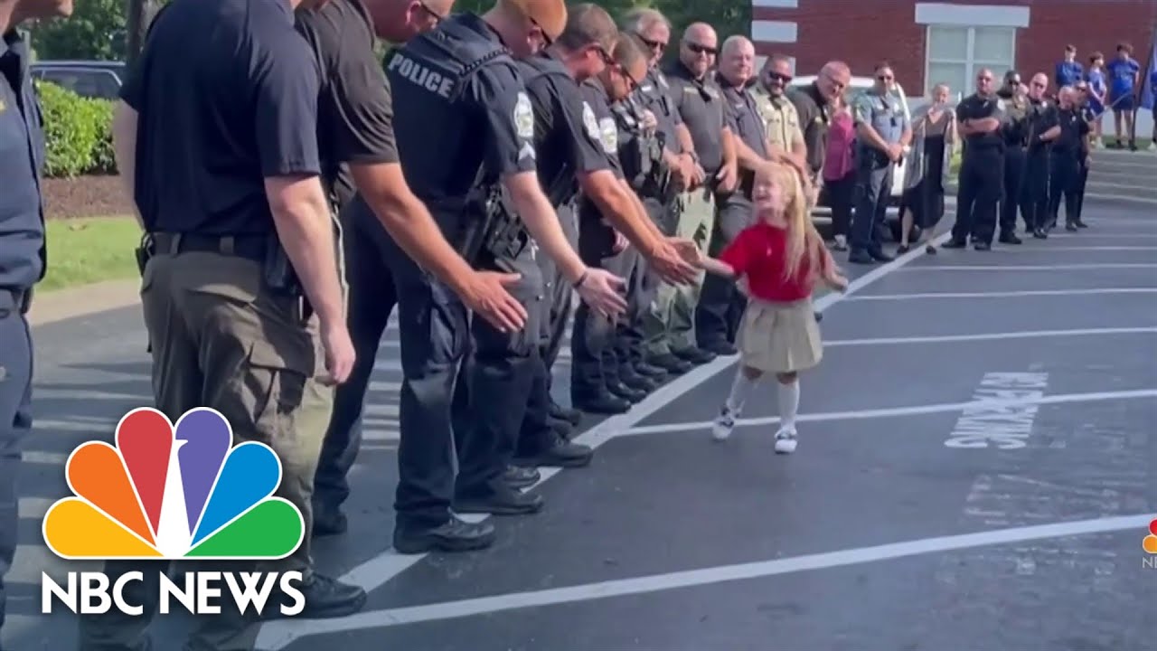 Dozens Of Officers And First Responders Welcome A 5-Year Old To Kindergarten