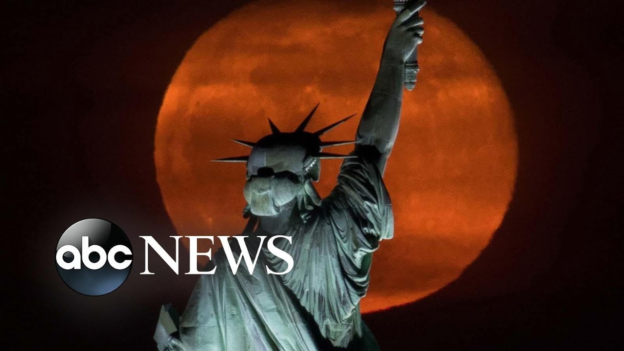 A Pink Moon, a dust storm and COVID-19 in India: World in Photos, April 28