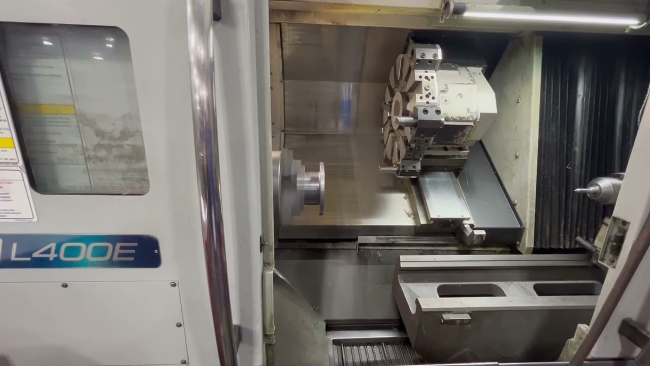 OKUMA GENOS L400E 2-AXIS CNC TURNING CENTER LATHE - YouTube