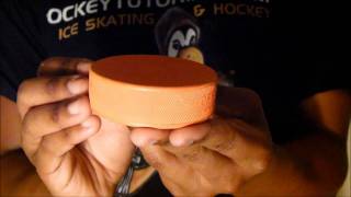 Inglasco Orange Weighted 10oz Training Hockey Puck