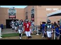 #Eagles quarterback Sam Bradford, in the red jersey, walks the players to practice Friday at the Niv