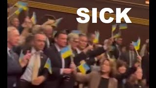 Dems wave UKRAINE flags in the US Congress. 61 BILLION dollar scam, everyone gets a cut. 3rd world!