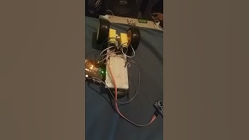 Provando circuito robot minisumo con sensor ultrasonico controlado por arduino...