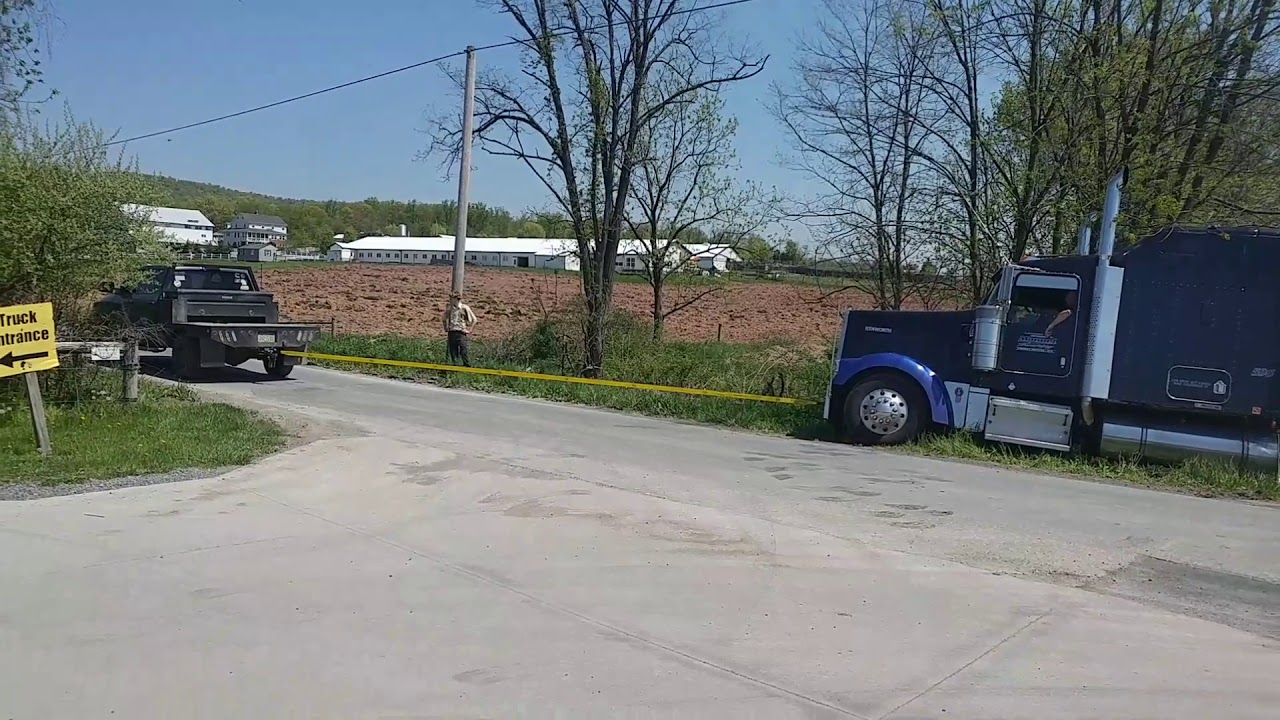Cummins pulls semi out of ditch - YouTube