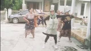 Viral KDM dance exercise with mothers in house dresses