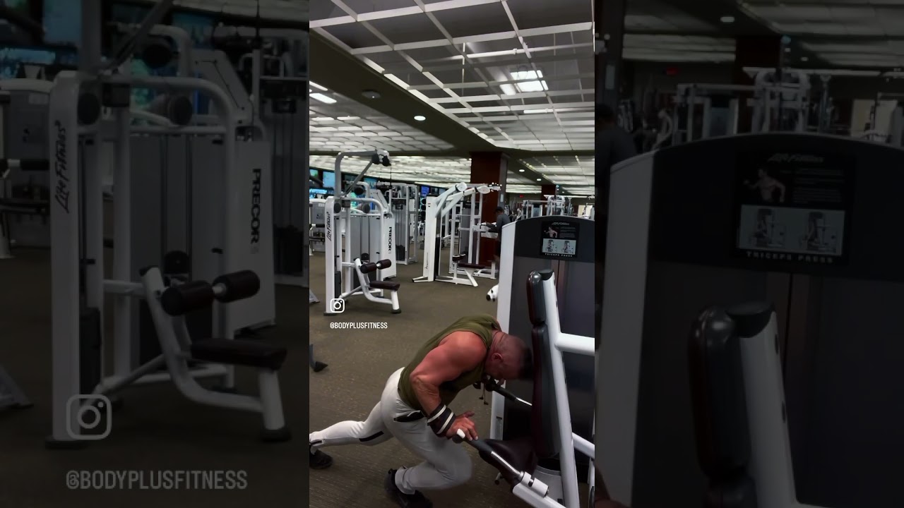 Try these leaning tricep extensions, facing the dip machine with your elbows close