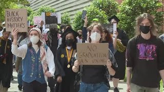 Large group of students walk out of graduation at Virginia CommonWealth University