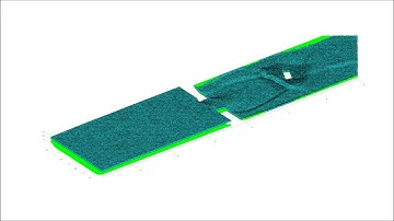 dam break flow against an isolated obstacle