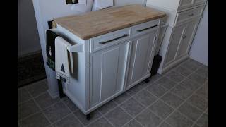 We bought a portable kitchen island from Bed Bath and Beyond and assembled it in our dining area in our rather small apartment.