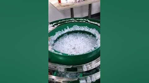 Automatic rotary dual head spout cap assembly machine