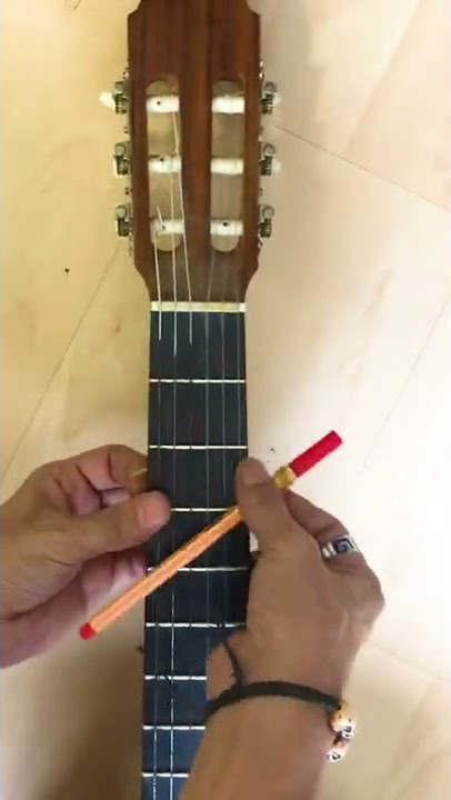 How to Make a Capo with Office Materials: 6 Steps (with Pictures)