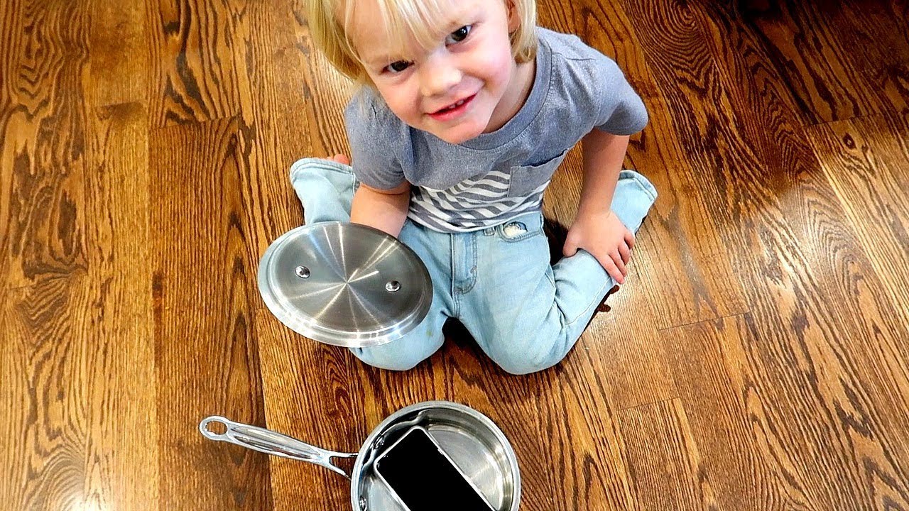 Toddler hides Moms IPHONE