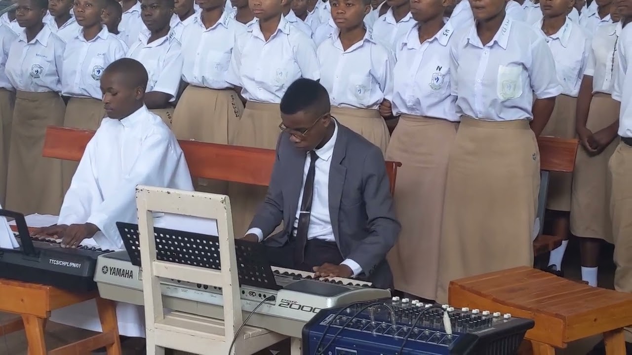 Agnus Dei by Ssenoga Alex performed by TTC SAVE Magnificat Choir.