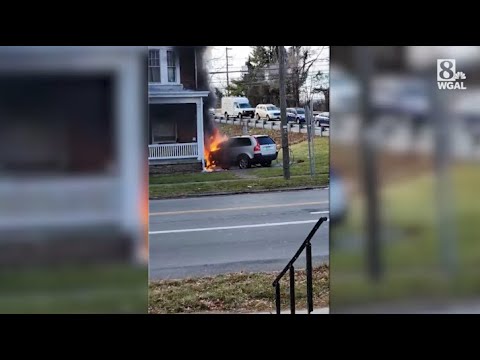 Burning vehicle rolls away after crash, hits Dauphin County home - YouTube
