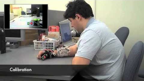 The Computer-Vision Assisted Vibrotactile Interface for Accessible Reaching (CAVIAR)