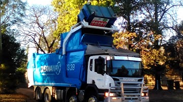 Cleanaway picking up a bin