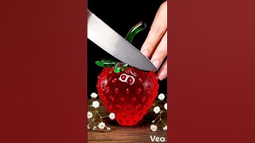 “Slow Motion Macro Art:Slicing a Red Glass Strawberry in Cinematic Detail|Ultra Realistic 4K Visual”