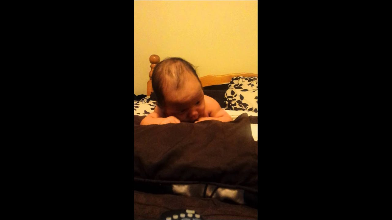 Kj propped up on pillows YouTube