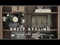 Shelf styling  mixing old and new